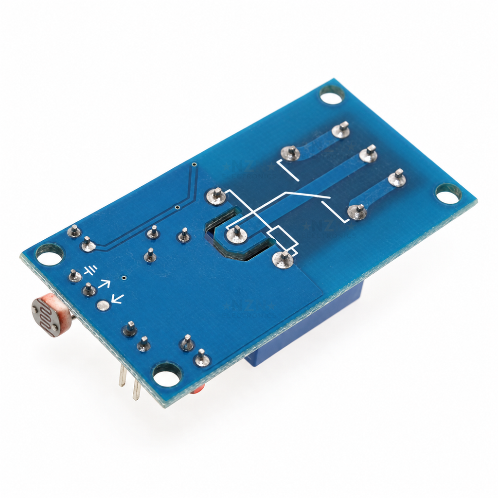 Underside of 12V Photoresistor Light-Control Relay Module, showing PCB solder joints and mounting holes