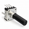12mm detentless rotary encoder at an angle, showing the steel front plate, smooth collar and black 6mm D shaft with its single flat on top, plus the three PCB pins
