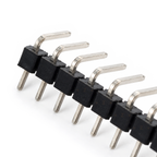 Close-up of the end of the right-angle header strip showing the 90 degree pin bends and the notches between blocks