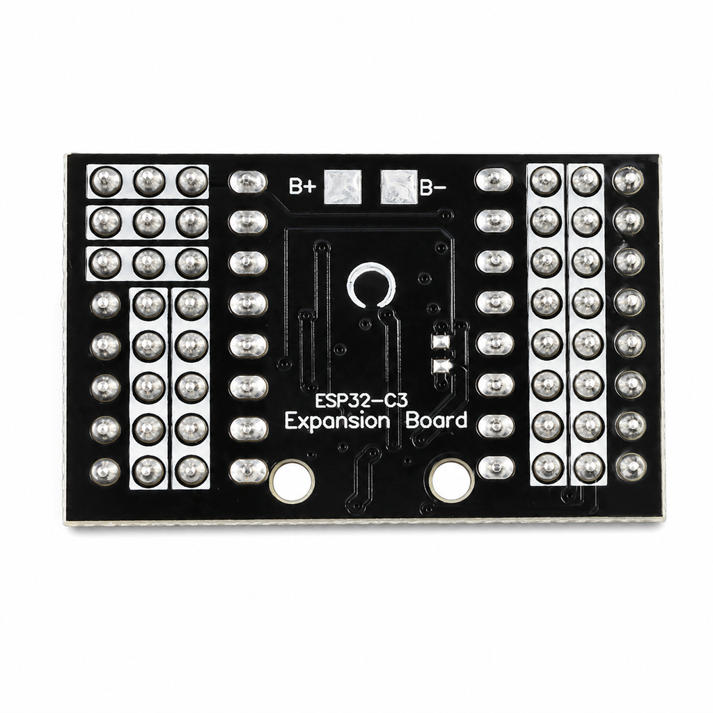 Underside of the ESP32-C3 expansion board showing the B plus and B minus battery solder pads