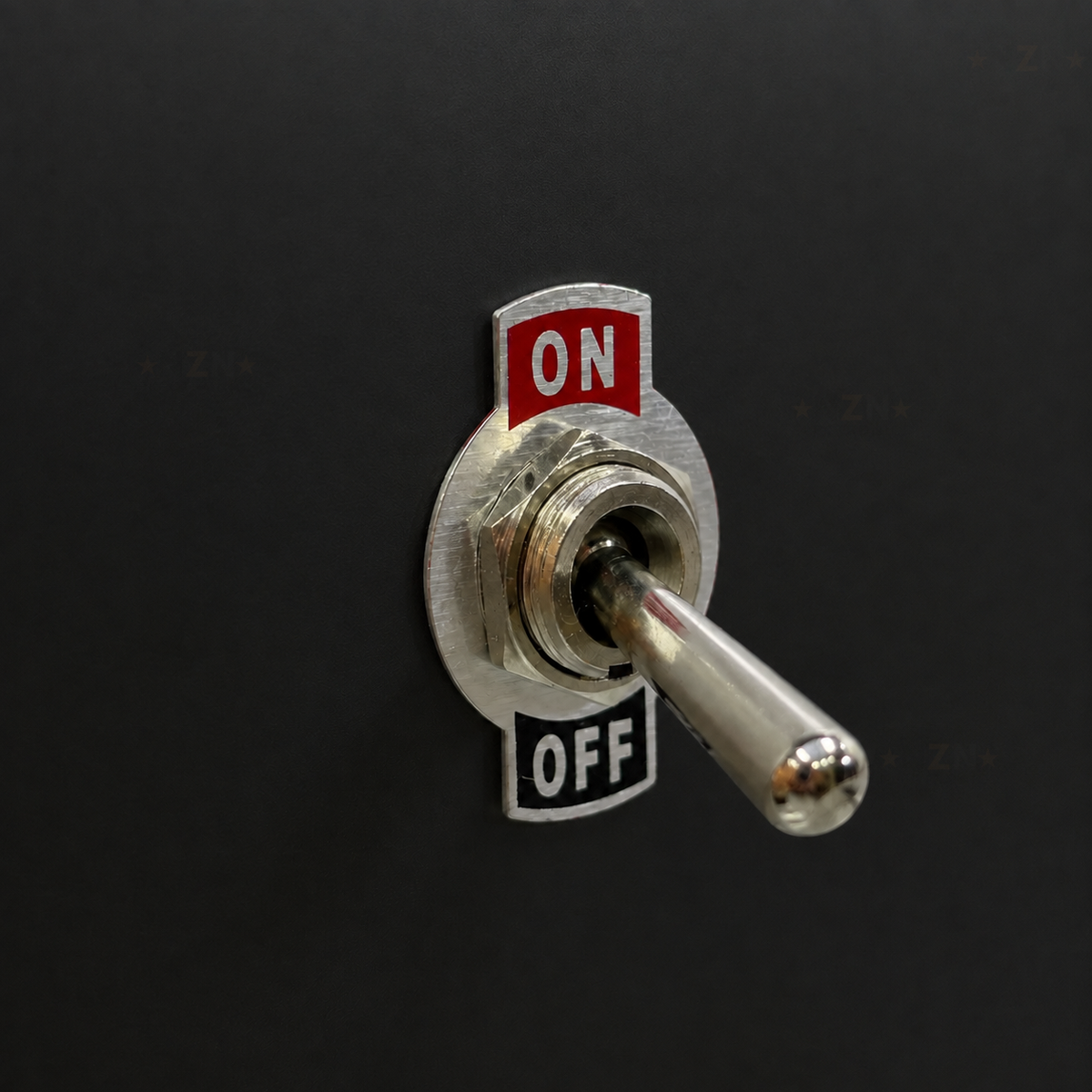 KN3C-101 toggle switch mounted through a black demonstration panel with ON/OFF plate; panel not included