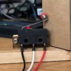 KW11-3Z roller limit switch mounted and wired as an endstop detecting a moving panel