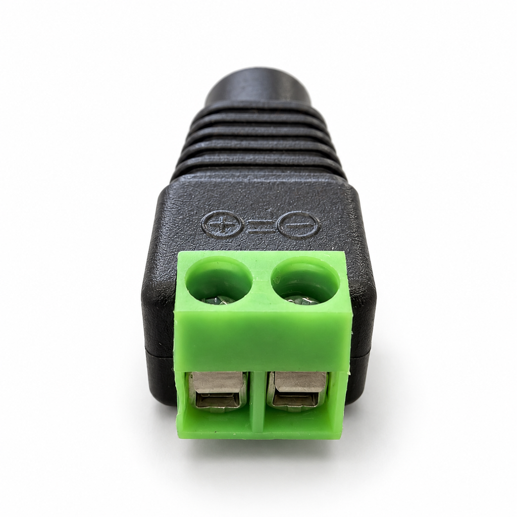 Terminal end of the adapter, two square wire entries with screw clamps under the + and - marks