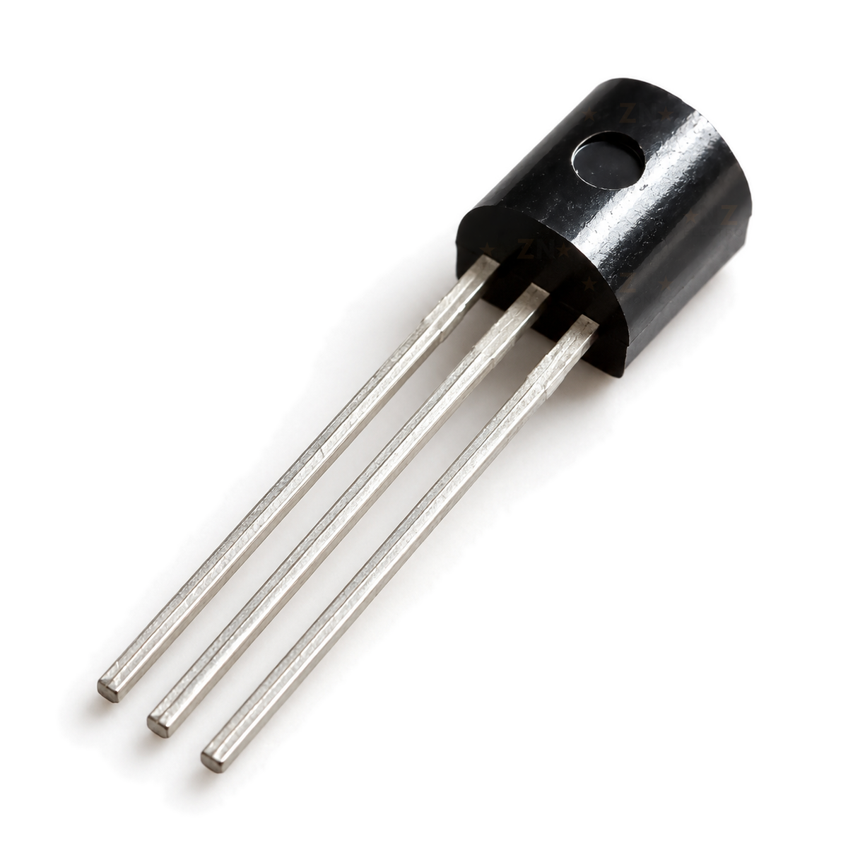 Rounded back of the TO-92 sensor body, showing the moulding dimple and lead spacing