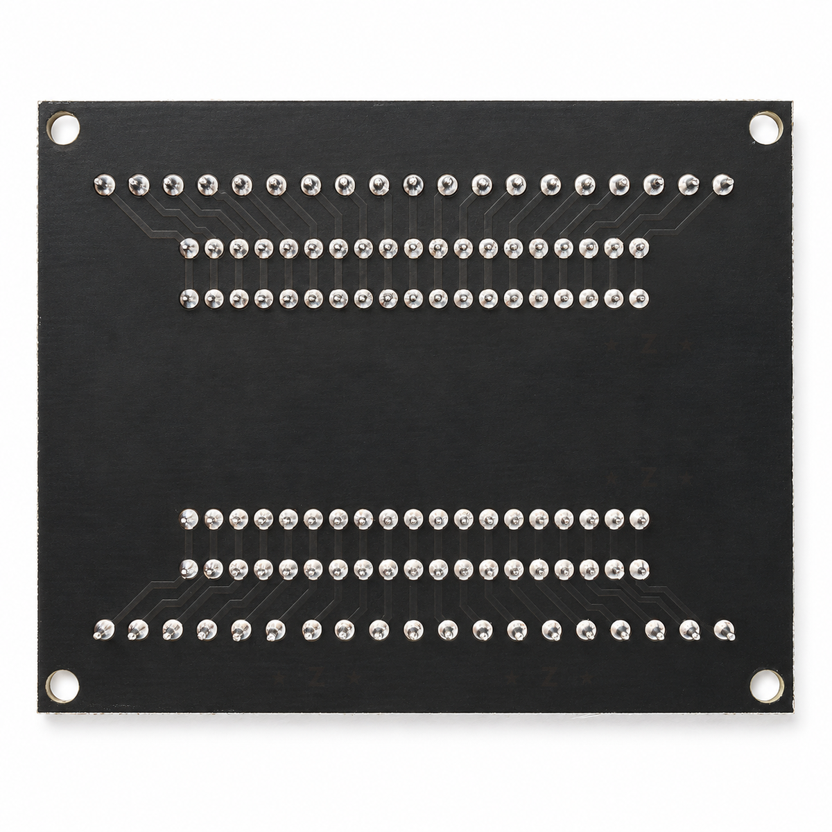 Underside of the ESP32 terminal adapter with the soldered terminal and socket joints and four corner mounting holes