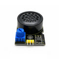 Keyestudio SC8002B audio amplifier module at an angle, showing the round black speaker, blue volume trimmer and the 3-pin header