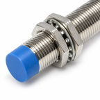 Close view of the blue sensing face, threaded body and fitted mounting nuts on the LJ12A3-4-Z/BY sensor