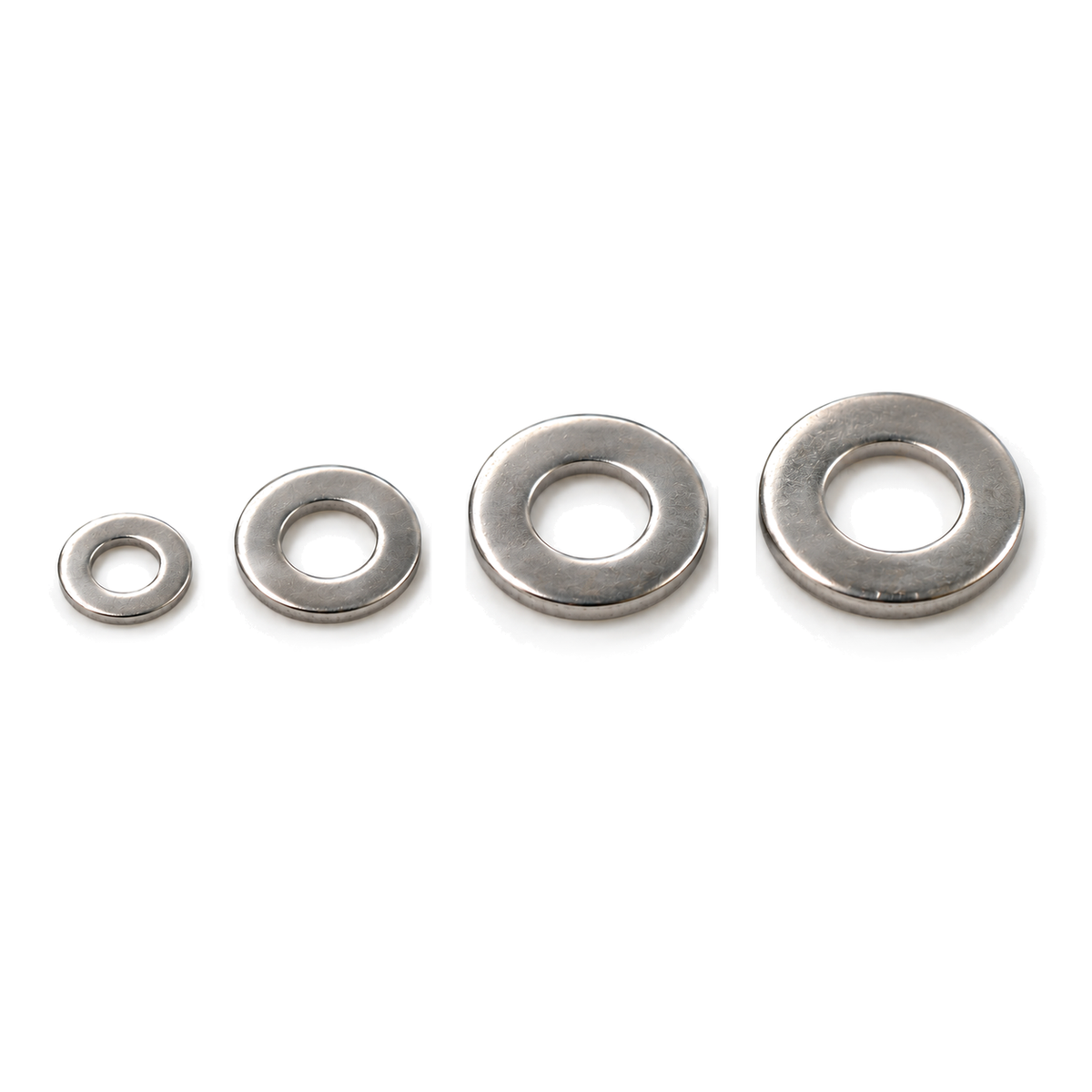M2, M3, M4 and M5 304 stainless steel flat washers in a row from smallest to largest