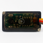 MG90S servo straight-on rear view showing PCB, case screws and right-side wire exit