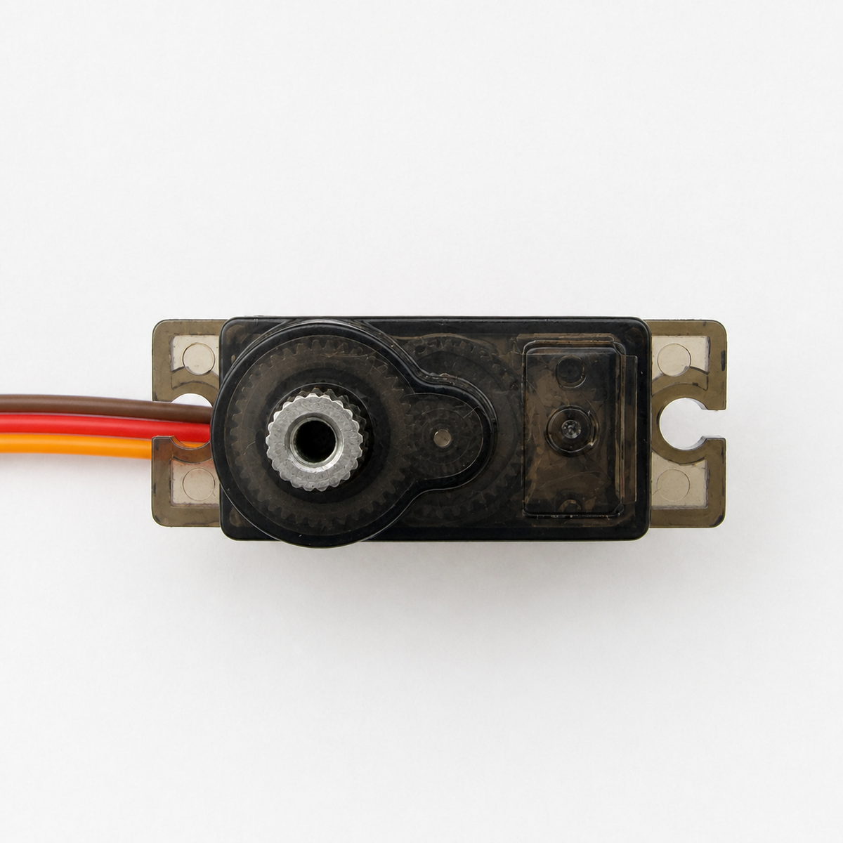 MG90S micro servo top view showing metal spline, translucent casing and mounting ears
