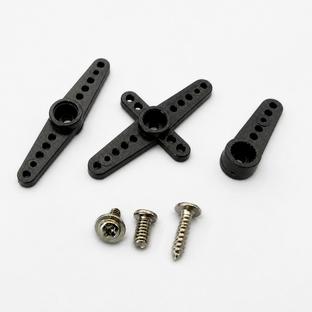 MG90S supplied servo horns and four mounting screws arranged on a white background