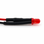 Close view of a red 3mm diffused LED, resistor heat-shrink and twin leads