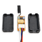 Opened mini relay receiver with PCB and two separate case halves on a white background