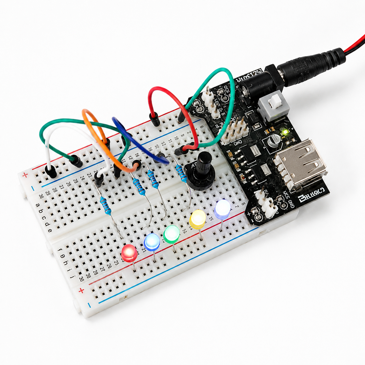 400 point breadboard wired up with LEDs, resistors, a potentiometer and a breadboard power module (components not included)