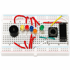 830 point breadboard wired with a buzzer, coloured LEDs, a tactile push button, a screw terminal block and jumper wires (components not included)