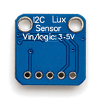 Underside of the VEML7700 board marked I2C Lux Sensor, Vin/logic 3-5V, with two mounting holes